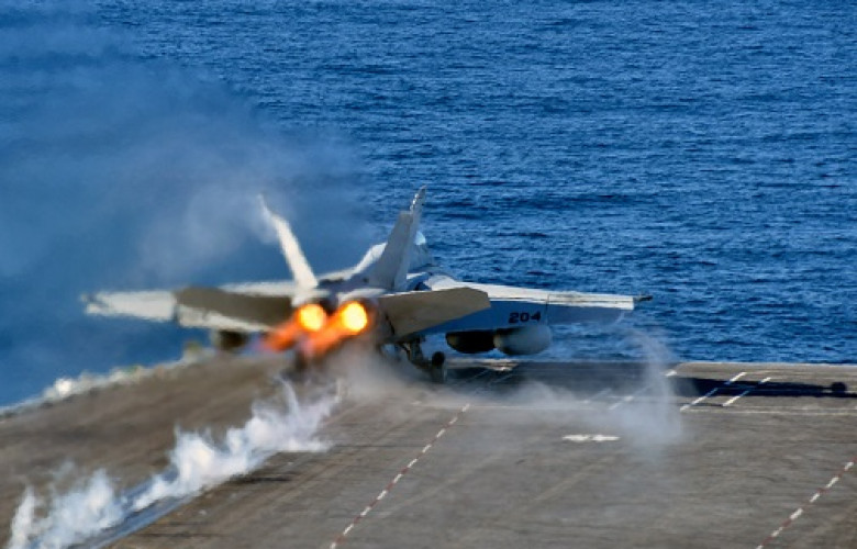 240318 An F A 18E Super Hornet launches from the aircraft carrier USS Nimitz. 31258300321